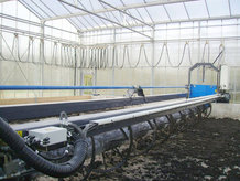 A Cable Festoon System is used for the Energy Transmission to a solar sludge drying mobile system